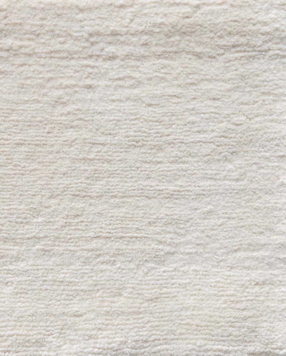 Handtufted alpaca cream colored textural rug